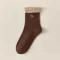 Calzini medi vintage autunno marroni da donna con polsino lavorato e ricamo a fiocco. - Donna 35-39 / Fiocco Piccolo