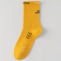 Men's breathable mid-tube basketball sports socks in bright yellow with trendy athletic prints. - One Size / Yellow