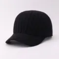 Detailed close-up of a black knitted baseball cap, soft winter warm woolen hat texture. - Adjustable / Vertical Stripe Brim Three Stripes - Black