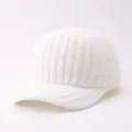 Close-up of the knitted texture and front brim details of the warm winter white baseball cap. - Adjustable / Vertical Stripe Brim Three Stripes - White