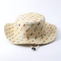 Detailed close-up view of the outdoor sun hat showing woven pattern and adjustable chin strap. - Wide Brim With Rope / Beige Plaid