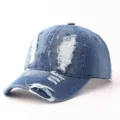 Trendy distressed denim baseball cap with creative paint splatter and ripped fashion details. - Adjustable / Dotted Graffiti Ripped Denim - Medium Blue