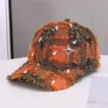 Orange brown plaid frayed baseball cap featuring sparkling rhinestones and metal star. - One Size / Orange
