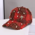 Distressed red plaid baseball cap with sparkling rhinestones and metallic star accent. - One Size / Red