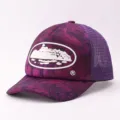Purple camouflage trucker mesh hat in vibrant purple tone with unique front graphic and curved brim. - Adjustable / Camouflage Cruise - Purple