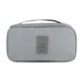 Grey travel organizer bag for underwear and toiletries with handle and zipper closure. - Gray