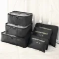 Black 6-piece travel organizer bags set, waterproof packing cubes for luggage clothing. - Black