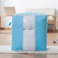 Sac de rangement pour couette en intissé épais avec fenêtre transparente et poignées. - Vertical / 47x28x50cm / Bleu