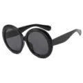 Trendige übergroße runde Sonnenbrille in Schwarz für einen retro Street-Fashion-Look - Glänzendes Schwarz / Grau