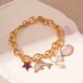 Gold charm bracelet with dolphin, shell, and star charms for ocean vacation style - Drip Oil Dolphin Tassel (4# Purple) / Gold