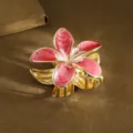 Elegant pink plumeria flower hair claw clip with a polished gold-tone metallic finish - Regular Fit / 5.5cm / Pink
