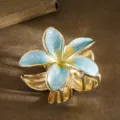 Elegant plumeria flower hair claw clip with blue enamel and gold-tone finish. - Regular Fit / 5.5cm / Lake Blue
