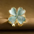 Elegant gold plumeria flower hair claw clip with light blue pearlescent enamel finish. - Four-Petal Flower / 5.5cm / Blue
