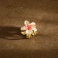 Elegant plumeria flower hair claw clip in gold metal with cream and pink enamel finish - 2.5cm / Outer White