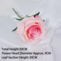 Single pink velvet artificial rose with green leaves on a white textured fabric background - Plush Series Single Rose / 9cm / Pink Heart