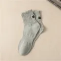 Men's grey crew socks made of comfortable combed cotton featuring a stylish embroidered arrow logo. - One Size / Light Gray