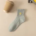 Men's grey mid-tube cotton socks featuring a yellow lightning embroidery, soft and casual. - One Size / Gray