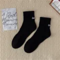 Men's black mid-calf socks with white embroidery letters, combed cotton casual daily wear. - One Size / Black