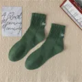 Men dark green mid-calf combed cotton socks with letter embroidery and comfortable fit. - One Size / Green