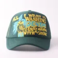 Green mesh baseball hat detail showing front colorful 3d embroidered text graphic and design. - Adjustable / DENTM - Green