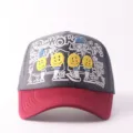 Grey red trucker hat with embroidered smiley faces and graffiti text, stylish streetwear. - Adjustable / Button Smiley Face - Grey & Red