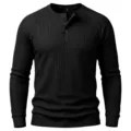 Black thermal waffle knit long sleeve henley shirt detail view with three front buttons. - Black
