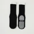 Antirutsch Yoga Socken für Damen, schwarze Grip Socken mit weißen Rippbündchen für Fitness. - Einheitsgröße / Schwarz