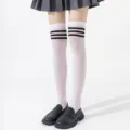 Japanese JK style student velvet over-the-knee socks featuring three black stripes in white. - Over-the-Knee Socks / White Base Black Bow
