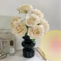 Elegant cream artificial rose bouquet in a sleek black vase for home tabletop decoration - Vase Set / Ivory