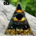 Handcrafted resin pyramid with black stones, gold foil and a lotus flower ornament - C4 Obsidian + Lotus + Obsidian / 5cm