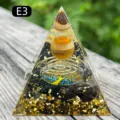 Handmade resin Orgone pyramid featuring a tiger's eye sphere, gold foil, and tree of life - E3 Tiger's Eye + Coil + Obsidian / 5cm