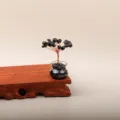 Handgemaakte mini zwarte obsidiaan kristallen boom met koperdraad op houten voet - Obsidiaan - boom van de rust (mini geldboom met 18 kralen)