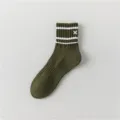 Olive green men's mid-calf socks with white stripes and embroidered X detail, comfortable variant. - Men's 39-43 / Green