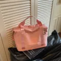 Pink travel duffel bag for women, portable shoulder fitness gym bag for short trips. - Pink