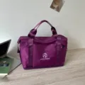 Purple travel duffel bag for women, portable fitness sports bag with shoulder strap. - Deep purple