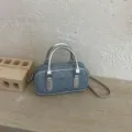 Chic denim pillow shoulder bag with silver handle, stylish casual crossbody handbag for women. - Silver