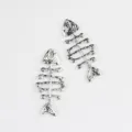 Silver fish bone charm pendant detail close up, perfect for DIY jewelry making earrings. - Silver