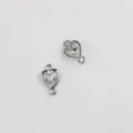 Close up detail view of silver alloy heart double loop connector charms for DIY crafts. - Hollow Artificial Pearl Style / Silver