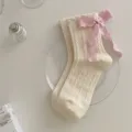 Korean style women cable knit mid tube socks with sweet pink ribbon bow, cute Lolita style. - Women's 35-39 / White with Pink Bow