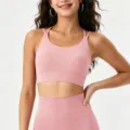 Reggiseno sportivo rosa con spalline sottili e coppe fisse, ideale per fitness, yoga e allenamento. - Rosa e Beige