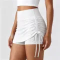 Minigonna sportiva bianca con pantaloncini integrati, vita alta e coulisse laterale per yoga. - Taglia S / Pantaloni e gonne / Bianco