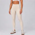 High-waist seamless nude feeling yoga pants in beige, perfect for fitness and daily gym wear. - S / Bottoms / Beige