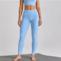 Light blue high waist yoga pants and sports bra set, seamless fitness activewear for women. - Glacier Blue Trousers / S