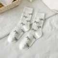 Calzini bianchi a metà polpaccio con graziosa stampa di fiocco nero, calze di cotone donna. - Taglia unica / Bianco