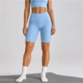 Light blue high-waisted seamless yoga shorts, tummy control fitness activewear for women. - Glacier Blue Bermuda Shorts / L