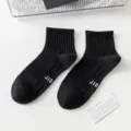 Men's black athletic breathable short socks, comfortable ribbed cotton crew socks for sports. - Crew Socks / Black