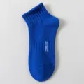 Royal blue men's athletic short cotton sock with breathable knit design and side letter detail. - One Size / Sapphire Blue
