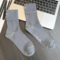 Grey men's crew socks with stylish yellow embroidery and letter print, comfortable athletic cotton. - One Size / Gray