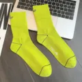 Neon green mid-calf sports socks with stylish letter embroidery and breathable cotton fabric. - One Size / Fluorescent Green