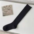 Chaussettes hautes côtelées noires pour femmes, chaussettes de mollet pour le quotidien. - Taille unique / Noir Mi-Bas